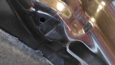 коррозии капота в местах касания с регулировочным буфером