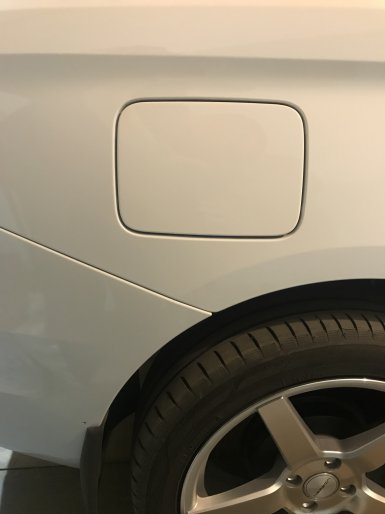 Простой способ установить запираемый лючок бензобака на Lada Vesta