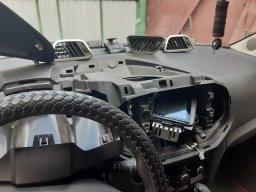 Центральная накладка торпедо