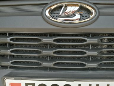 установка защитной сетки в решетку радиатора Lada Niva Travel