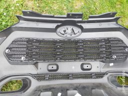 установка защитной сетки в решетку радиатора Lada Niva Travel