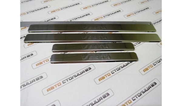 Накладки на пороги с надписью тиснением для Lada Vesta
